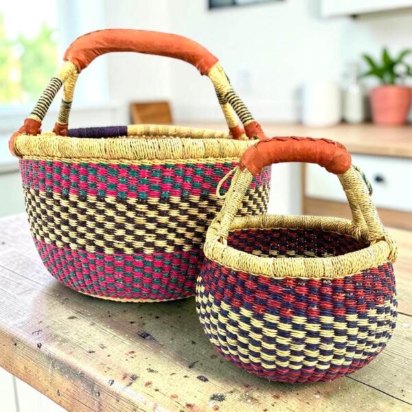 bolga-basket-round-duo-pink-green-multicolour-bashiri Round Bolga basket duo in pink, green and natural elephant grass with leather handles