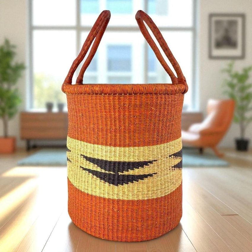 Handwoven Bolga laundry basket with geometric design, made from elephant grass in Ghana