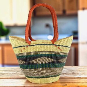 Long handle market basket with a geometric diamond band in deep, cool tones and leather-wrapped handles