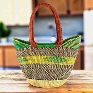 Long handle market basket with a zigzag pattern in fresh, bright tones and leather-wrapped handles