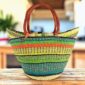 Extra large market basket, lime green, teal and orange stripes over natural straw, with rounded leather handles