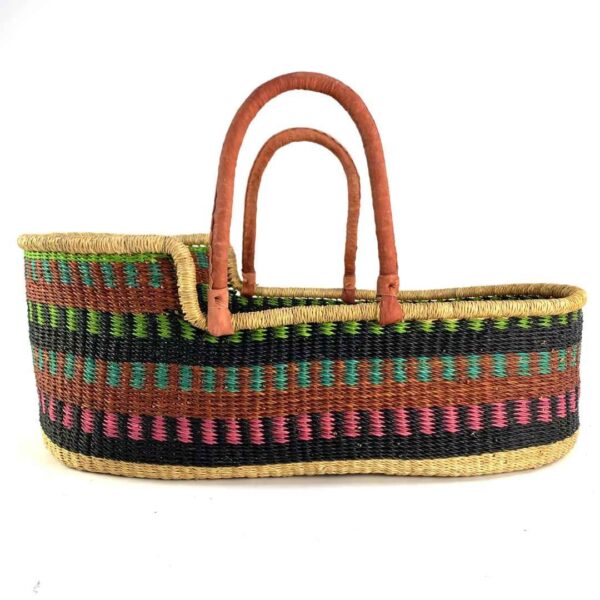 bolga-moses-basket-177-dreamy-dark-multicolour-elephant-grass-african-basket-bashiri-3 Front view of the Moses basket with rows of rust, green, blue-green, and pink flecks on a dark body