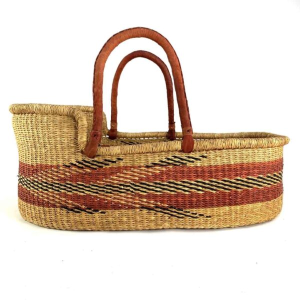bolga-moses-basket-178-gurgle-rust-zigzag-elephant-grass-woven-bashiri-3 Front view of the Bolga Moses basket with a wide rust band and fine black zigzag lines