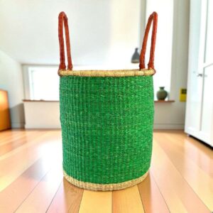 Open bolga laundry basket, solid emerald green with natural rim and base, tall leather handles