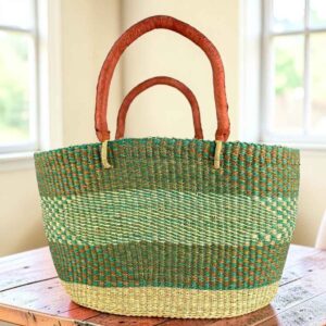 Green and tan Brighton basket with natural base band, leather handles