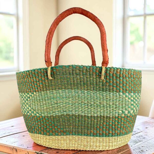 Green and tan Brighton basket with natural base band, leather handles