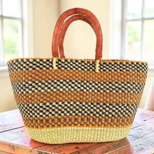 Orange and black checkerboard Brighton basket with natural base, leather handles