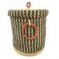 Front view of the closed laundry basket with a black and natural check, a woven lid and leather ring handles on a white background