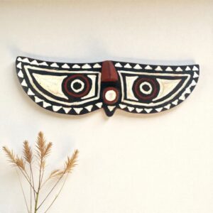 Decorative African butterfly mask with bold patterns