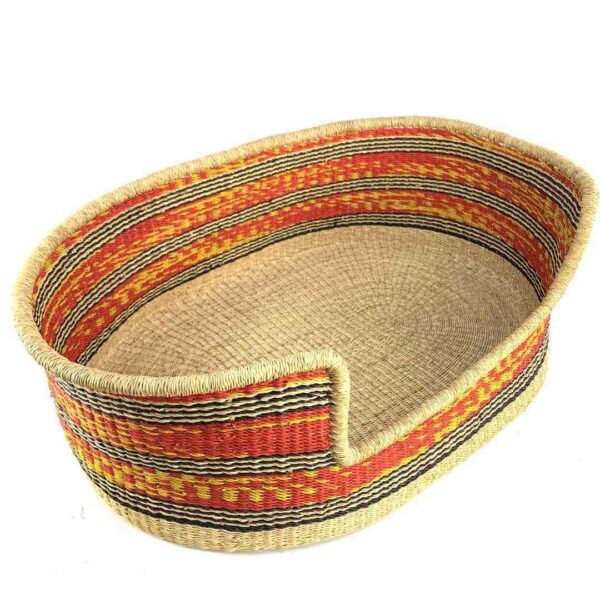 extra-extra-large-pet-dog-basket-008-swing-2 Angled view of the XXL red and orange pet basket showing the woven elephant grass base
