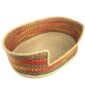Angled view of the XXL red and orange pet basket showing the woven elephant grass base
