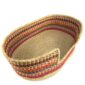 Angled view of the XXL striped pet basket showing the woven elephant grass base