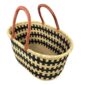 Angled view of the extra large oval Bolga basket with an all-over black and natural check, showing the woven interior