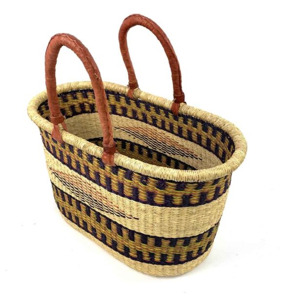 extra-large-oval-015-illusion-diamond-pattern-basket-bolga-woven-bashiri-2 Angled view of the extra large oval Bolga basket with black and mustard bands with a central diamond motif, showing the woven interior