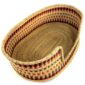 Angled view of the extra large Bolga dog bed showing rows of red, black, and brown flecks