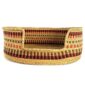 Front view of the extra large woven dog bed with a low entry and a red, black, and brown pattern