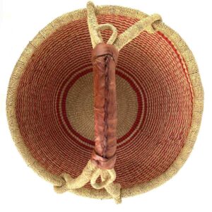 Top view of the red striped XL round Bolga basket showing the woven base and leather-wrapped handle