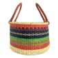 Front view of the warm and dark-toned striped hamper basket on a white background