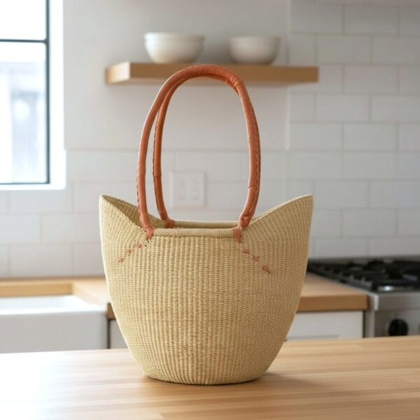 Natural long handle Bolga shopping basket handwoven in Ghana with leather handles