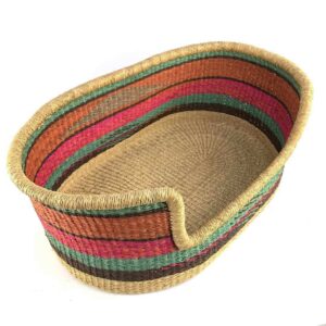 Angled view of the medium striped pet basket showing the woven elephant grass base
