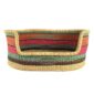 Front view of the medium coral, pink and green striped Bolga pet basket with its dipped front