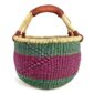 Angled view of the medium round Bolga basket showing green, navy and pink zigzag pattern