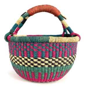 medium-round-basket-670-waterways-woven-2 Angled view of the medium round Bolga basket showing a teal and magenta checker weave with a cream-and-black band