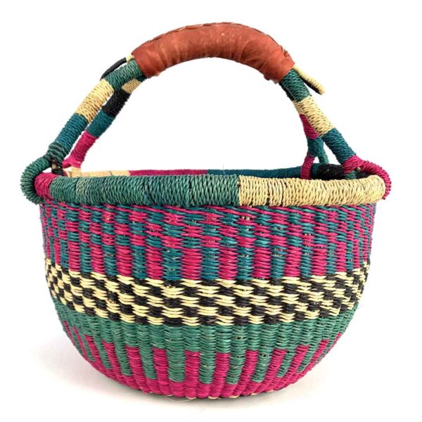 medium-round-basket-670-waterways-woven-2 Angled view of the medium round Bolga basket showing a teal and magenta checker weave with a cream-and-black band
