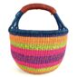 Angled view of the medium round Bolga basket showing a navy rim with orange, lime green and magenta bands