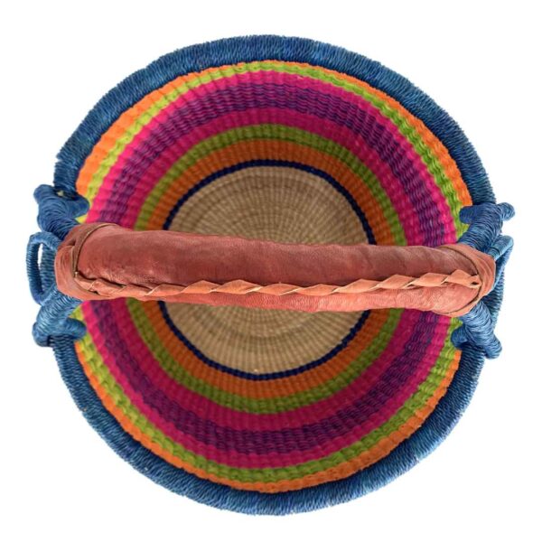 medium-round-basket-671-perch-woven-3 Front view of the medium round Bolga basket with a navy rim with orange, lime green and magenta bands