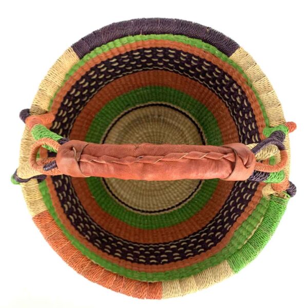 medium-round-basket-682-hoopoes-woven-3 Front view of the medium round Bolga basket with an orange-and-cream rim with green, orange and plum bands, the plum band with cream dot detail