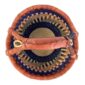 Top view of the warm-toned zigzag medium round Bolga basket showing the woven interior and handle