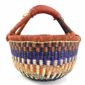 Front view of the warm-toned zigzag medium round Bolga basket, handwoven from elephant grass
