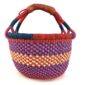 Front view of the bright checked medium round Bolga basket, handwoven from elephant grass