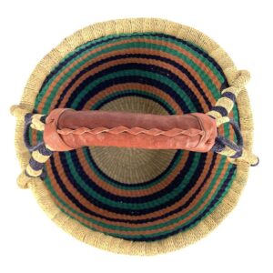 Top view of the cool and warm striped medium round Bolga basket showing the woven interior and handle