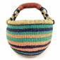 Front view of the cool and warm striped medium round Bolga basket, handwoven from elephant grass