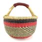 Front view of the warm and dark banded medium round Bolga basket, handwoven from elephant grass