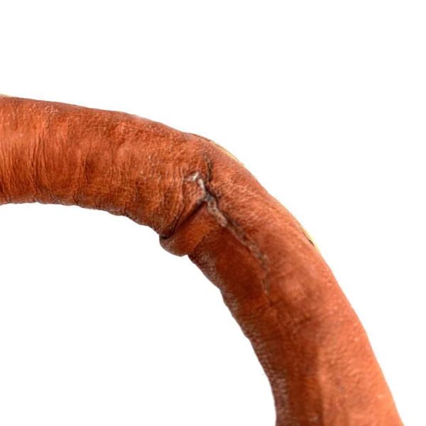 mini-african-market-basket-332-sleuth-bashiri-4 Close-up of the scratching on the leather handle of the mini market basket