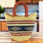 Mini market basket with a deep-toned diamond band and warm accent stripes and leather-wrapped handles