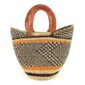 Front view of the mini market basket with a dark zigzag pattern on a natural weave