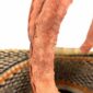 Close-up of the scuffing on the leather handle of the mini market basket
