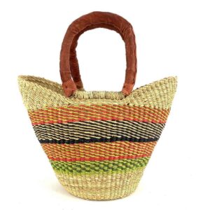 Front view of the mini market basket with warm, earthy stripes on a natural weave