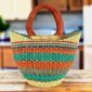 Mini market basket with bold stripes in bright warm and cool tones and leather-wrapped handles