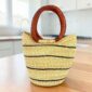 Small Ghanaian market basket handwoven from natural fibres