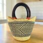 Handwoven Ghanaian mini basket with carry handle