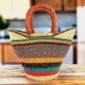 Mini market basket with close stripes in deep and bright tones and leather-wrapped handles