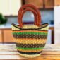 Mini market basket with bold stripes in a deeper multicolour mix and leather-wrapped handles