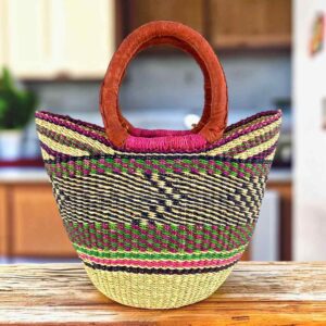 Mini market basket with a dark geometric pattern with a bright rim accent and leather-wrapped handles