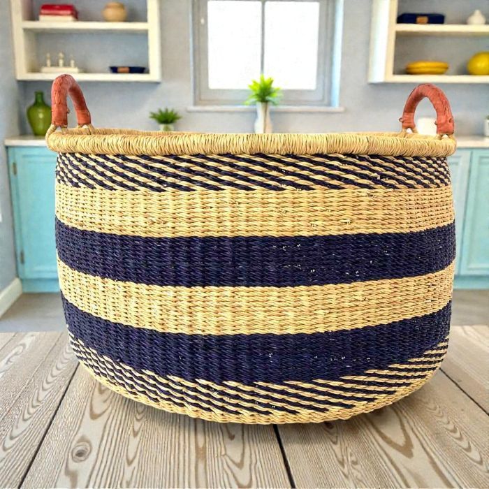 Large woven African hamper basket in natural and navy stripe with leather handles, Bolgatanga Ghana
