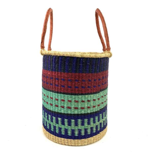 open-laundry-basket-118-epic-navy-green-african-bashiri-3 Front view of the open laundry basket with navy, red and mint green bands and tall leather handles on a white background